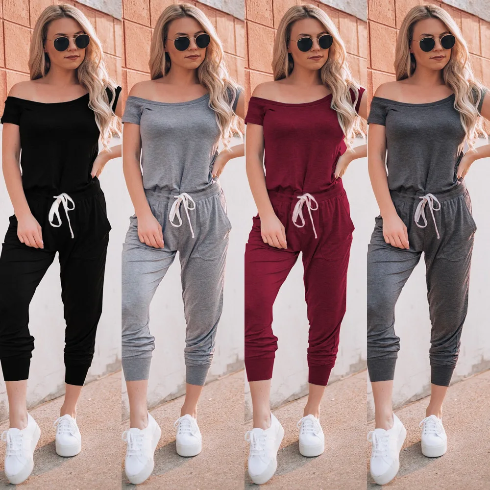 

2019 Women Summer Solid One Shoulder Short Sleeve Jumpsuits Lace up Slope Neckline Oblique Collar Casual Sports Pocket Playsuit