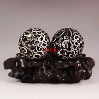 

OLD COLLECTIONS A PAIR CHINESE SILVER CARVING DRAGON BALL.