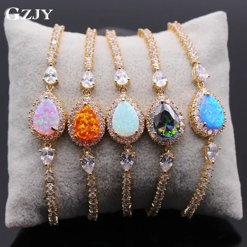 

GZJY Beautiful Bracelet Champagne Gold Color Bule/Pink/White/Orange Fire Opal Colorful AAA Zircon Bracelet&Bangle For Women
