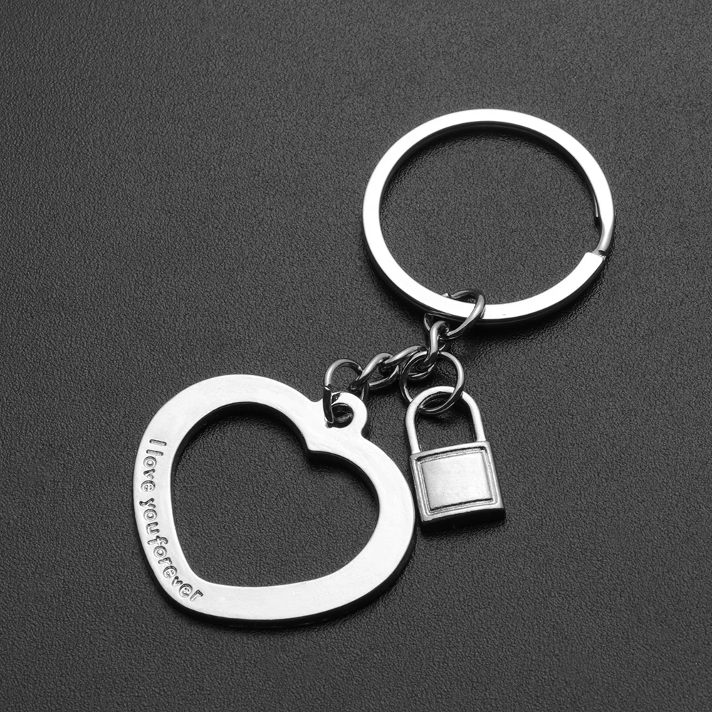 парный брелок для влюбленных. брелок для влюбленных. брелок "любовь". брелок металлический. серебряный брелок влюбленные.