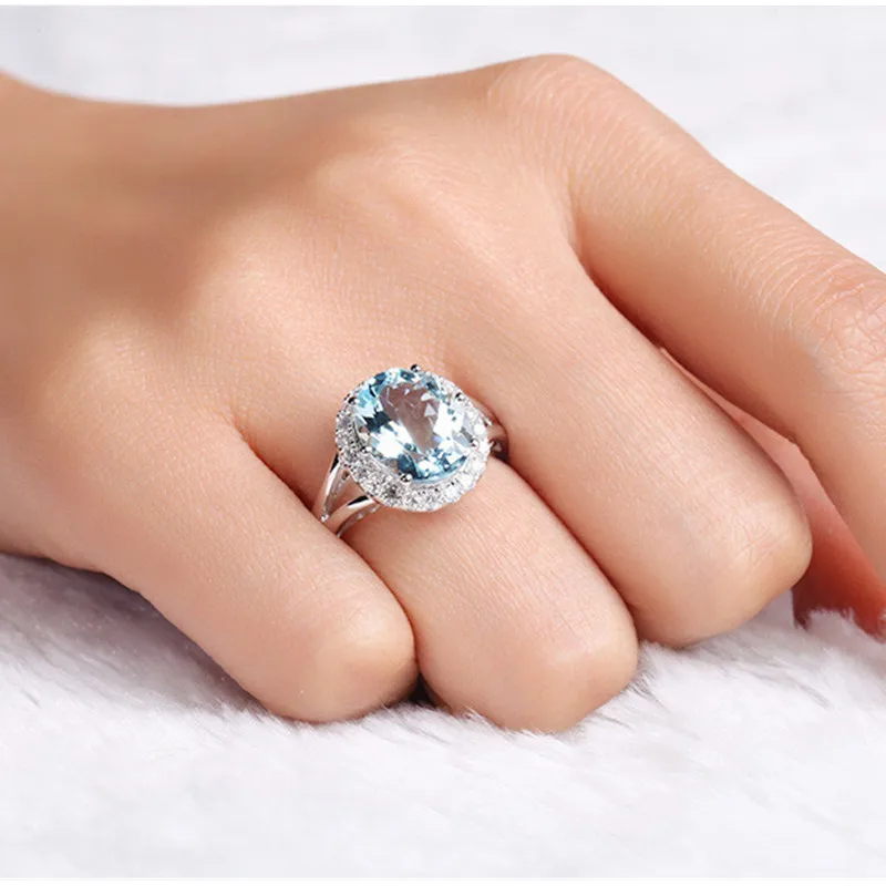 QYI овальной огранки 3 ct Природный Голубой топаз кольца 925 серебро натуральный драгоценный камень Обручальное кольцо со светлым окаймлением обручальные кольца для женщин