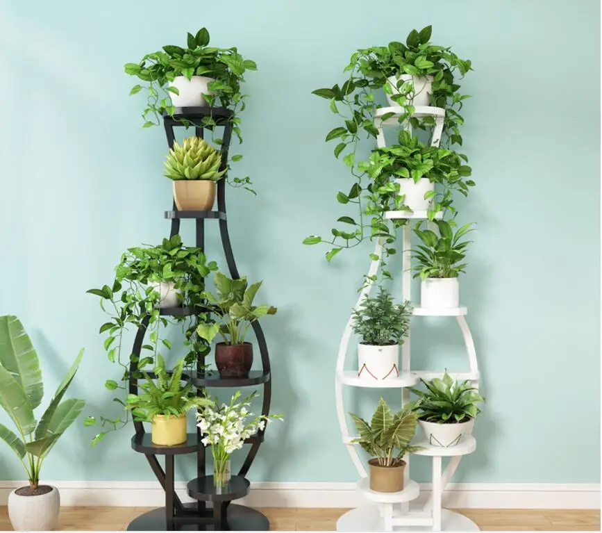 The living room household use pattern rack multilayer indoor special price balcony iron work circular buy content rack adornment