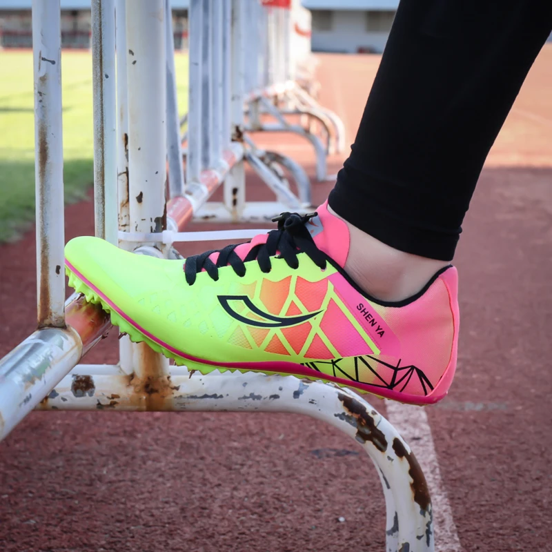 Шипы для бега обувь черный розовый мужские женские спортивные и полевые кроссовки весна лето Нескользящие кроссовки для бега гвозди