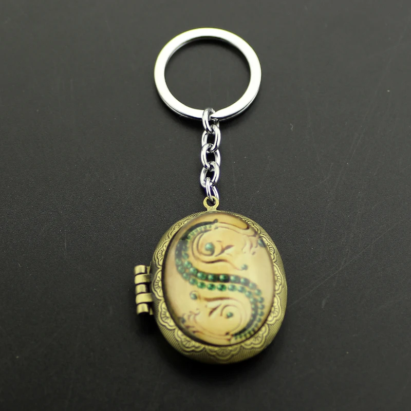 

Magic Slytherin Keychain Locket S Horcrux Locket Glass Box Keyring For Women Fans Fashion Jewelry Key Chain Accessories Trinkets