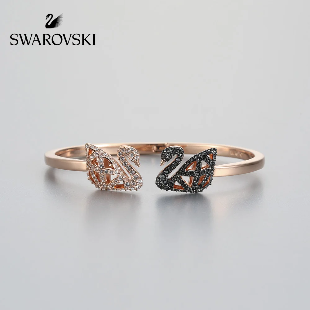 

Original Genuine Swarovski FACET SWAN Stylish hollow out swan bracelet with black and white accents 5289535