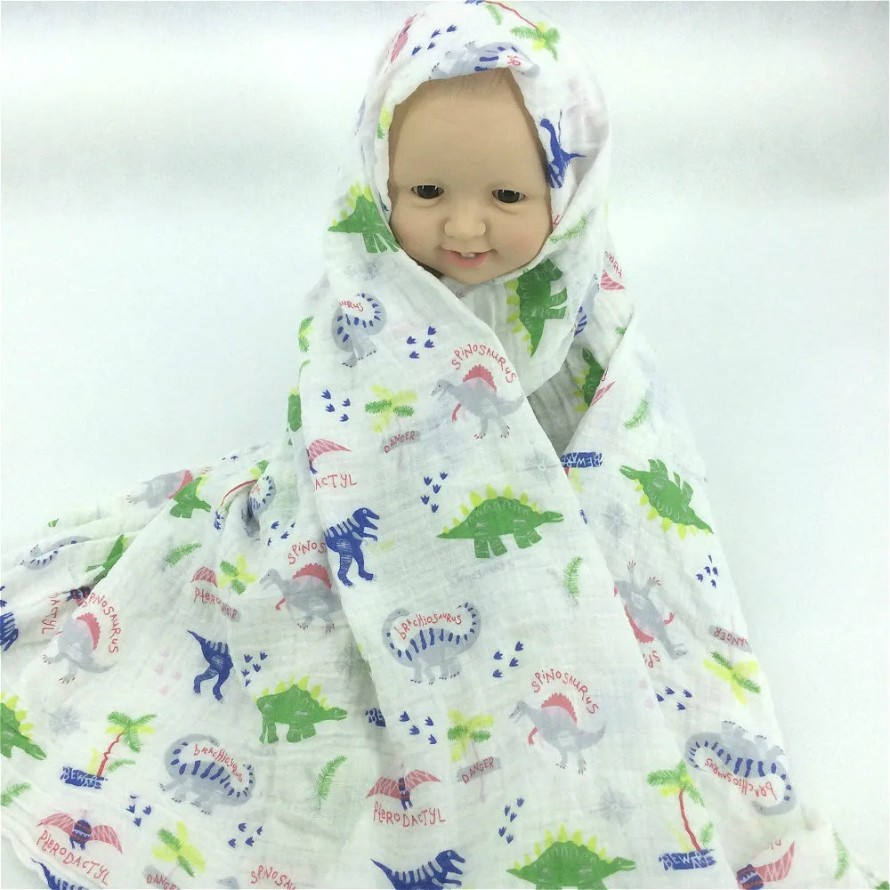 the dinosaur muslin baby