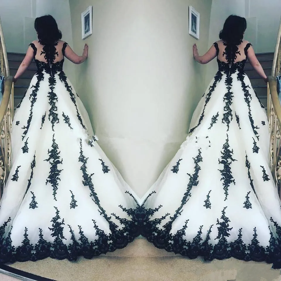 

Black and white Lace Wedding Dresses Capped Sleeves Sheer Neck Applique court Train gothic corset Wedding Bridal Gowns