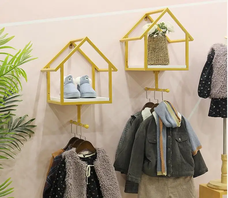 

Clothing store display rack wall hanging children's clothing side hanging rack children's clothing iron art is hanging rack.