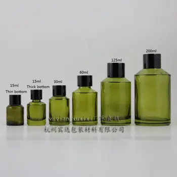 

30ml olive green Glass bottle With black aluminum screw cap and reducer.for Essential Oil/liquid cream/lotion,glass Container