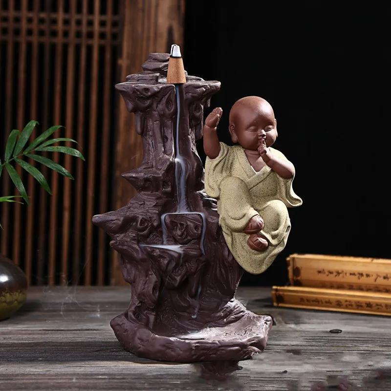 

ceramic home furnishing articles aloes, tower incense sandalwood aroma stove there are the young monk monk back present