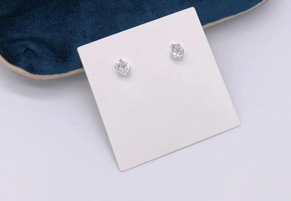 Sterling Silver cat face design stud earrings with cubic zirconia stones