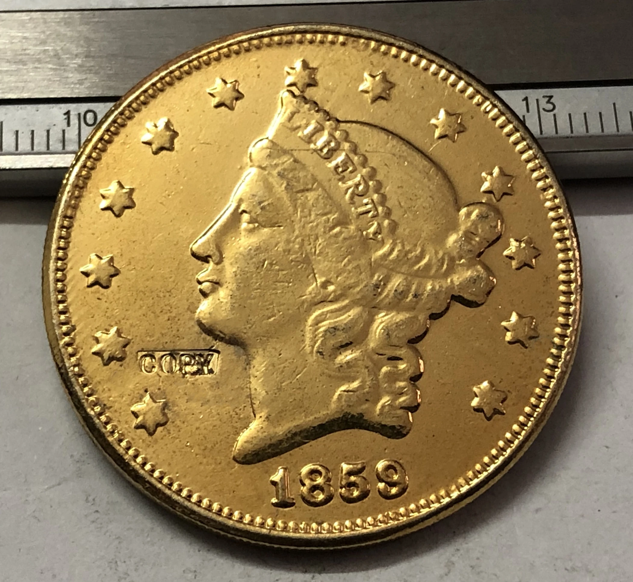 1859 P.O.S США LIBERTY HEAD (без девиза на обратной стороне) $20 позолоченная копия монеты |