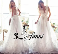 2017 Elegant A Line Beach Wedding Dresses Lace Sexy Deep V-neck Sheer Backless Appliques Sweep Train Bridal Gowns vestidos de no