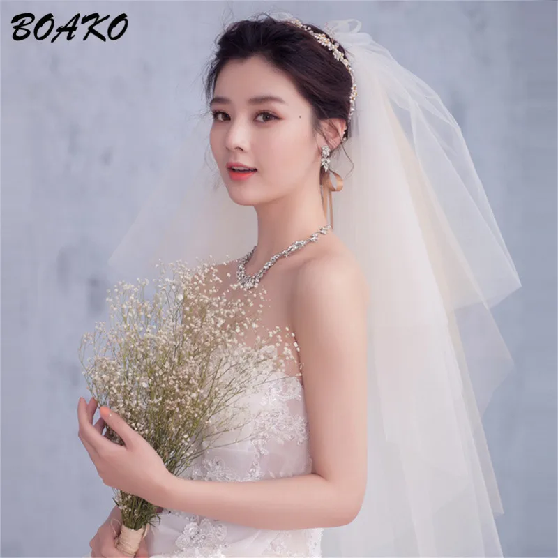 

BOAKO Cut Edge Puffy Tulle Bridal Veil Fingertip Length Elegant Wedding Veil With Comb 4 Layer White Champagne Velos De Novia