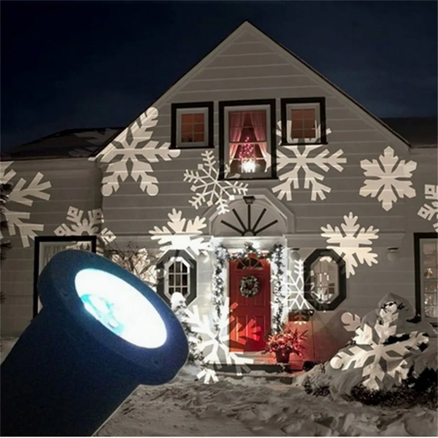 ФОТО Waterproof Moving Snow Laser Projector Lamps Snowflake LED Stage Light For Christmas New year Party Light Garden Lamp Outdoor