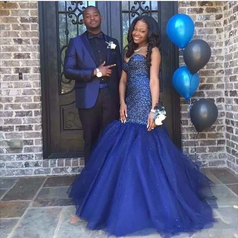 royal blue and gold prom couple