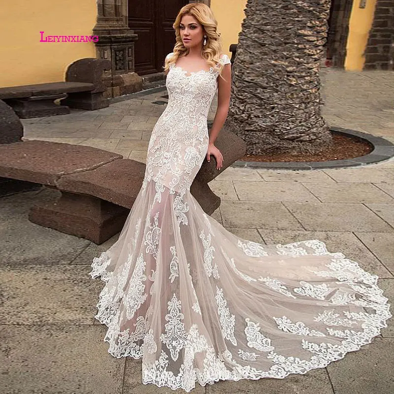 

LEIYINXIANG New Arrival Luxury Bride Dress Wedding Dress Vestido De Noiva Sereia Robe Sexy Mermaid Appliques Backless Sweetheart