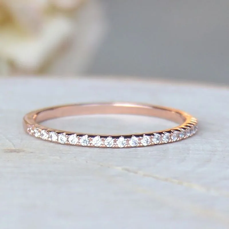 rose gold engagement ring with silver wedding band