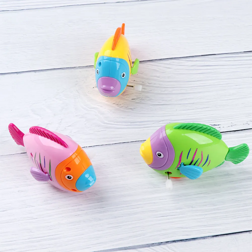 1pc Colorful Fish Shape Clockwork Toy Move The Tail Classic Toy Hobbies Cartoon Fish Wind Up Toy for Children Color Random 1pc Colorful Fish Shape Clockwork Toy Move The Tail Classic Toy Hobbies Cartoon Fish Wind Up Toy for Children Color Random