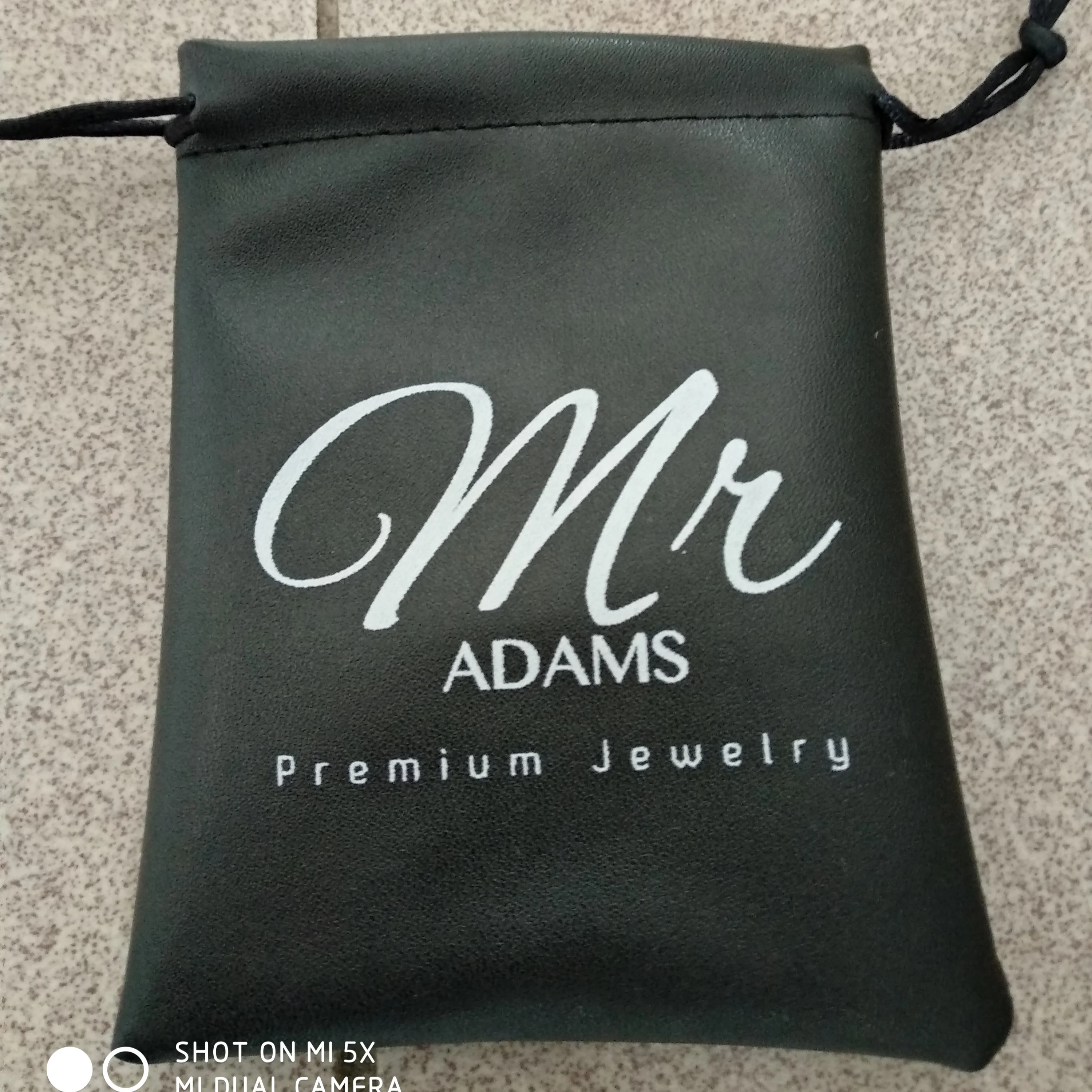 

Высококачественная сумка из искусственной кожи на шнурке для ювелирных изделий, оптовая продажа, индивидуальная стандартная упаковка и хранение ювелирных изделий