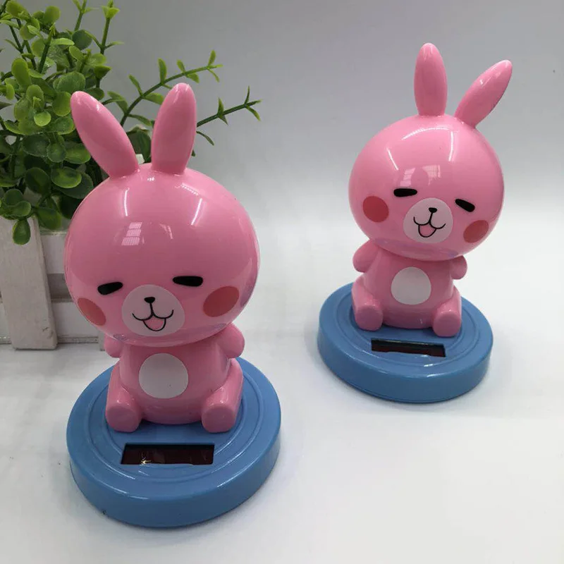Car ornament plastic car dashboard doll solar cartoon rabbit toy gift