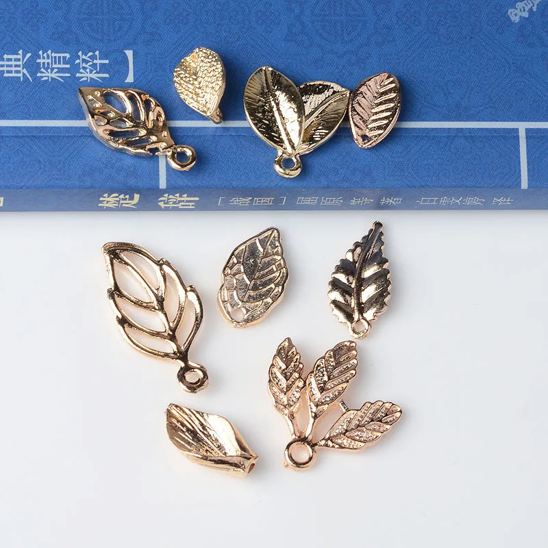 

50PCS Gold tone Alloy Material Small Leaf Charm Hollow leaf Pendant for Wedding Head DIY Handmade Jewelry Making