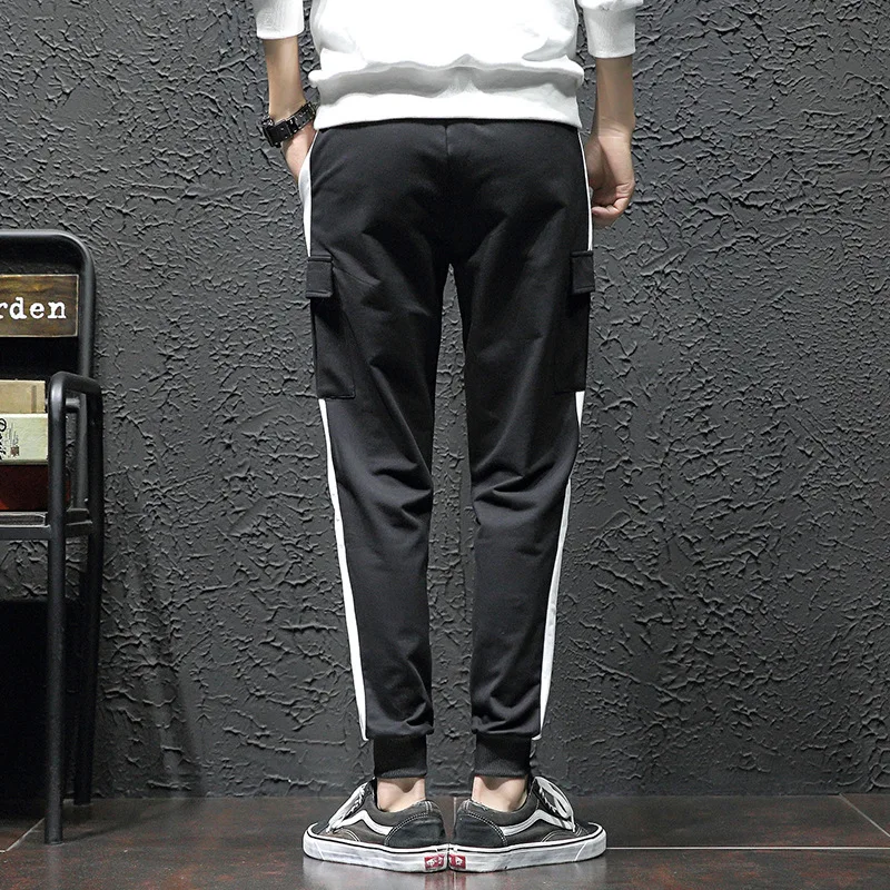 Spring tide brand casual trousers men's multi-legged feet feet pants Slim men's casual overalls men's street style black pants Spring tide brand casual trousers men's multi-legged feet feet pants Slim men's casual overalls men's street style black pants
