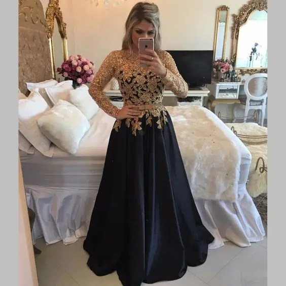 long sleeve black and gold dress