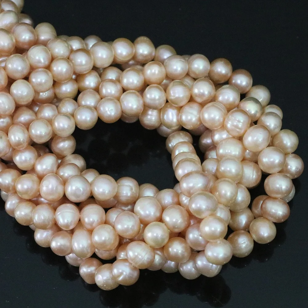 

Orange natural freshwater nearround pearl factory price 9-10mm wholesale price elegant loose beads hot sale Jewelry 15inch B1396