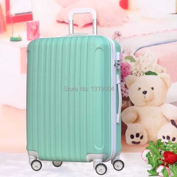 mint green carry on luggage