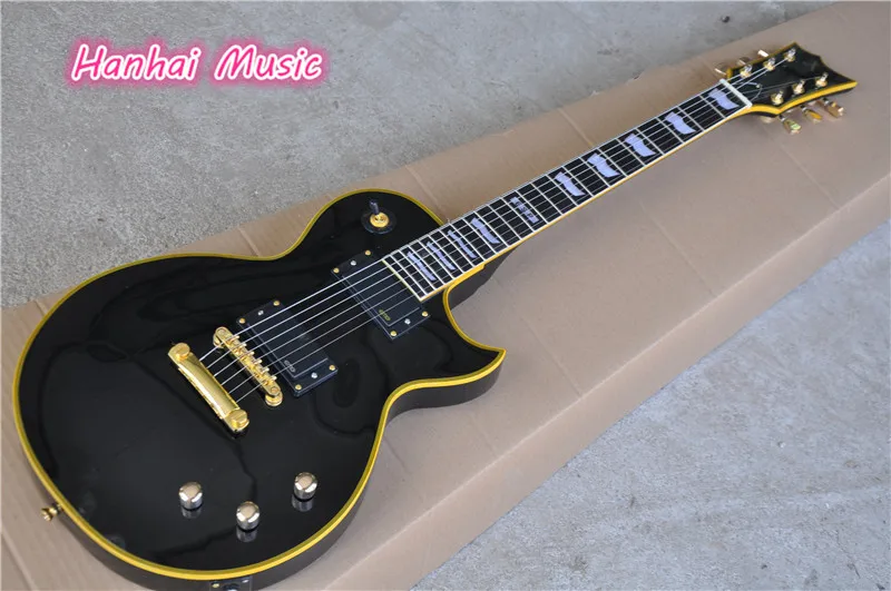 

Hot Sale Electric Guitar,Black Color Body with Gold Hardware,Yellow Binding Around Body and can be Customized