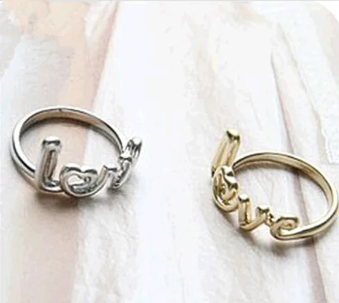

OMH wholesale 7.75 18mm gold silver jewelry fashion personality LOVE Letter alloy ring for women JZ44