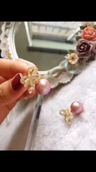 

gorgeous pair of AAA++ 10-11mm round south sea lavender pearl earring 925s