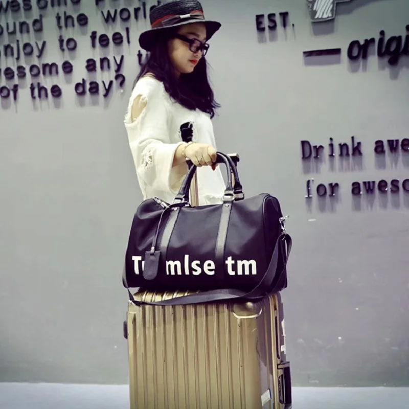 

Female handbag luggage bag portable travel bag men 's travel bag large luggage baggage