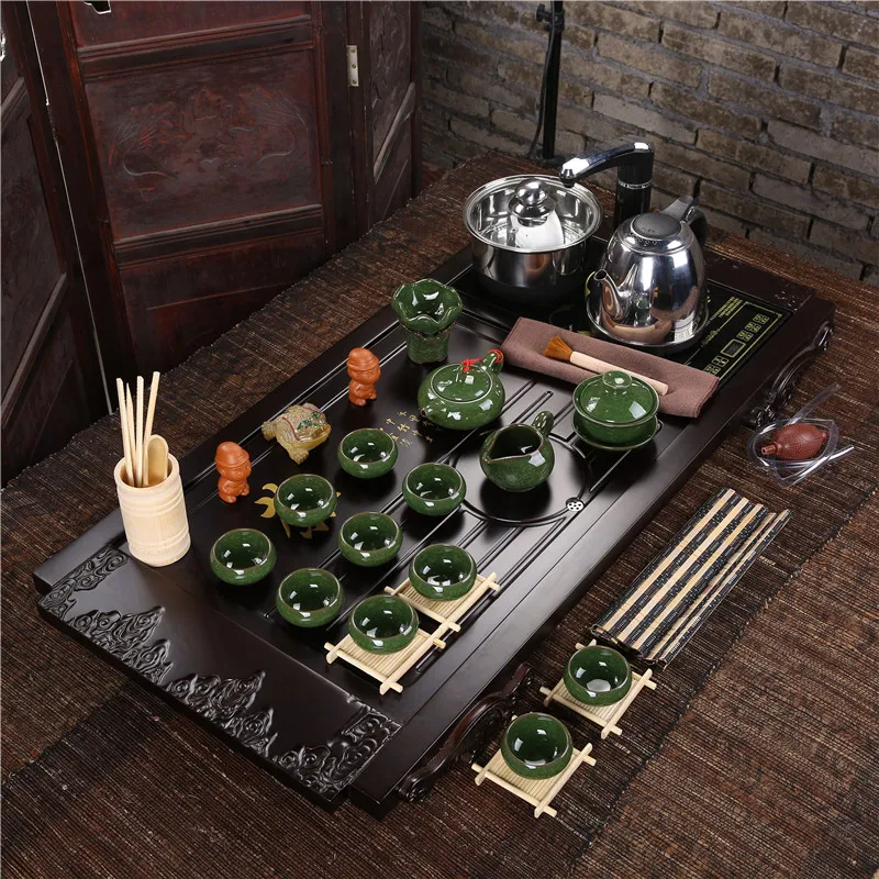 

Four factory direct piece of wood Binglie Tea Set Yixing tea sea new upscale cooker