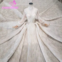 Robe De Mariee 2019 Bridal Dresses Long Puffy Sleeves Bridal Gowns Beads Details High Neck Lace Appliques Crystals Wedding Gown цена Robe De Mariee 2019 Bridal Dresses Long Puffy Sleeves Bridal Gowns Beads Details High Neck Lace Appliques Crystals Wedding Gown цены онлайн