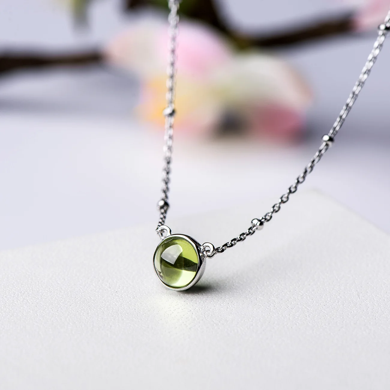 silver peridot necklace