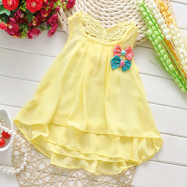 newborn baby girl yellow dress
