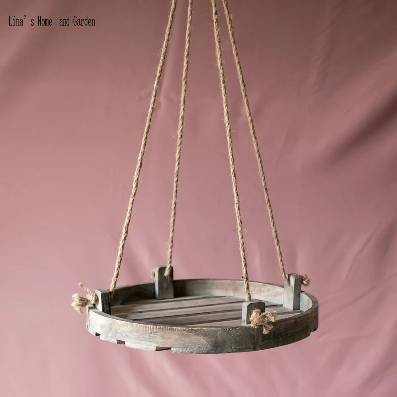 

vintage handcrafted round hanging rope shelves