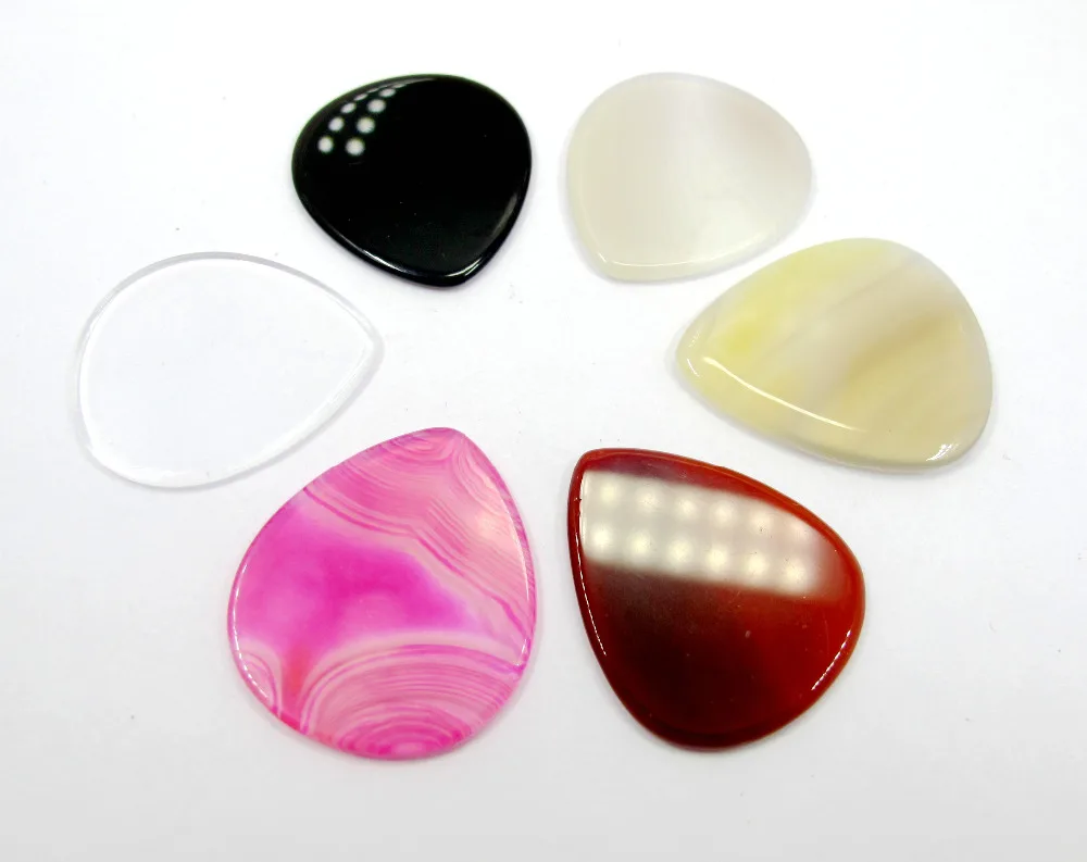 

Wholesale Mixed 4pcs/lot Stone Agate Crystals Guitar Picks Guitar Finger Picks Gem Stone Picks for Guitar around 27x30x2mm