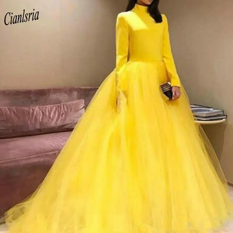 yellow long sleeve gown