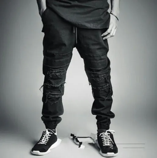 Рваные Jogger Брюки мужские хип-хоп новые модные эластичный шнурок на талии разрушенные черные брюки мужские s порванные штаны High Street