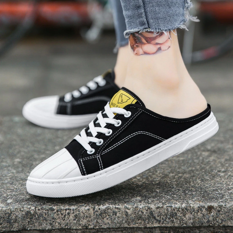 black slip on canvas shoes