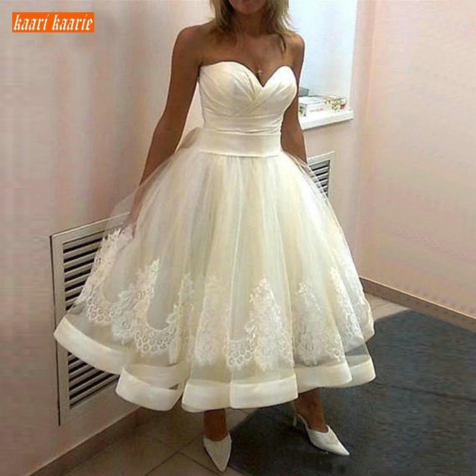white satin tea length dress