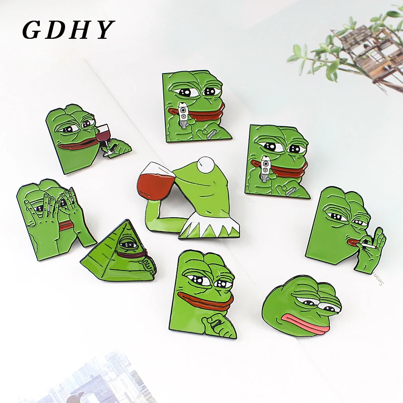 

GDHY Enamel Frog Pepe Pin Brooch Smiling Sad Take Guns Smoke Drink Red Wine Drink Tea Frog Pepe Button Brooch Badge Frog Jewelry