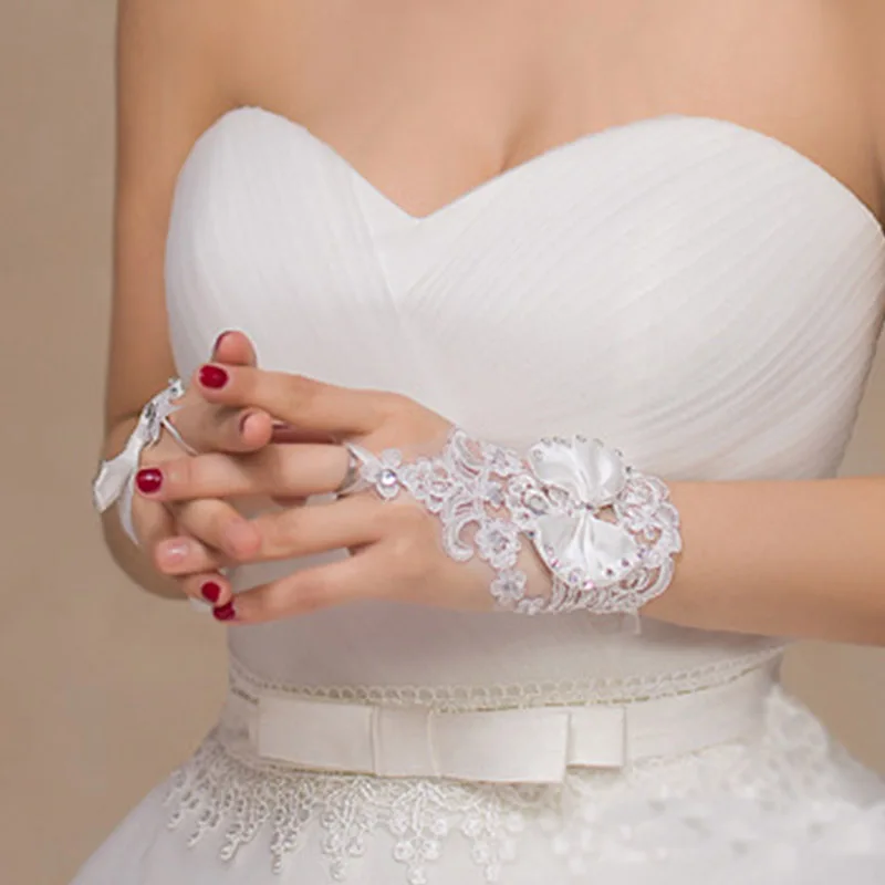 Белый короткий цвет слоновой кости свадебные перчатки для невесты без пальцев Свадебные перчатки Кристаллы бисером бант кружевная перчатка свадебные аксессуары JL