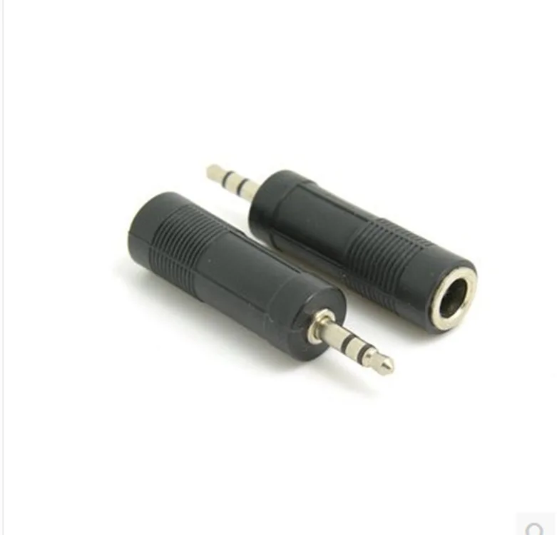 

Audio converter plug 3.5 male to 6.5 mother computer audio interface 6.5 female head to 3.5 male microphone conversion head