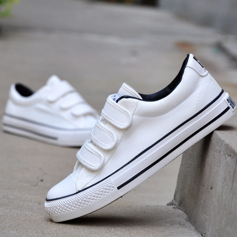 white canvas velcro shoes