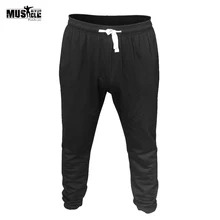 Мужские спортивные штаны для бодибилдинга, фитнес-тренировка, облегающие брюки, хлопковые карманы, черный, серый цвет, брендовая одежда, Muscle ALIVE