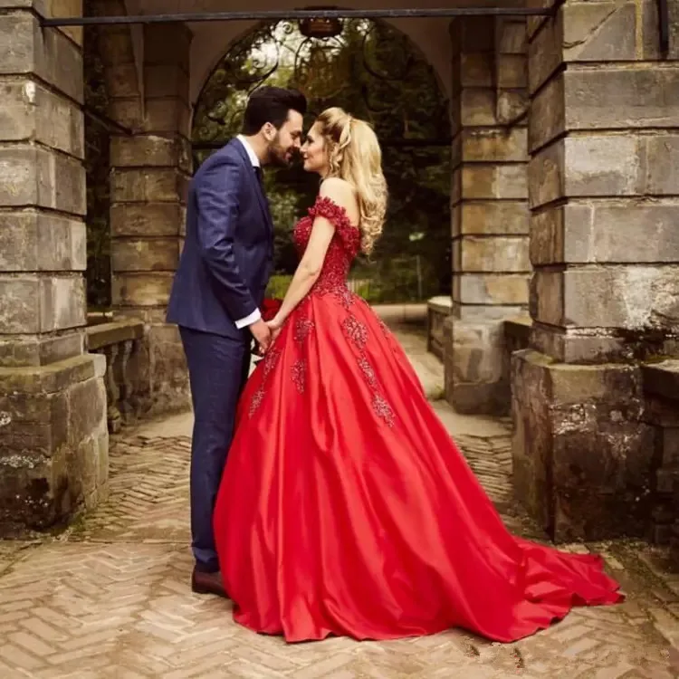 luxury-ball-gown-red-wedding-dresses-lace-appliques-beaded-off-the-shoulder-capped-sleeves-sweep-train-wedding-gowns.webp (4)_